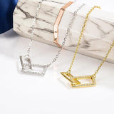 Double Ring Cross Necklace with Diamond Accent