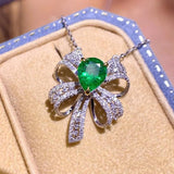 ANGEL Silver Emerald Gemstone Bow Pendant Zircon Necklace