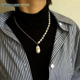 Baroque Pearl Choker Necklace with Flameball Pendant