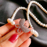 High-end Pearl Necklace Sweater Chain with Butterfly Decoration