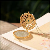 Sterling Silver Gilded Gray Jade Buddha Pendant in Flower Hollow Pattern Niche