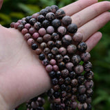 Natural Rhodochrosite Beads 6-10mm Smooth Round 15in