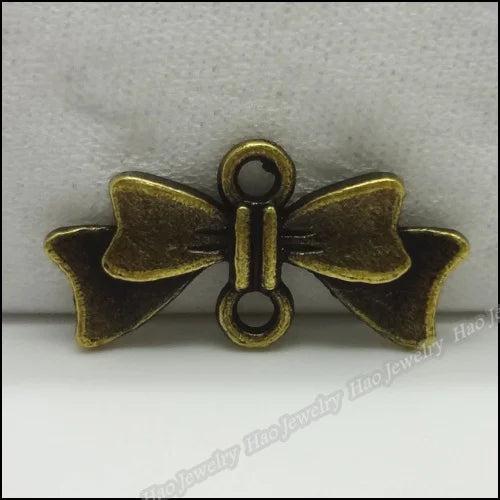 100pcs Vintage Charms Bow Pendant Bronze DIY Jewelry Making