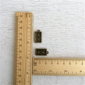 8 Antique Bronze Tape Cassette Charms Music Pendants 12x23mm