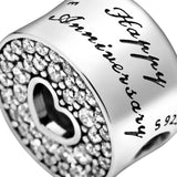 Sparkling Round Cutout Pav? & Heart Anniversary Charm Bracelet