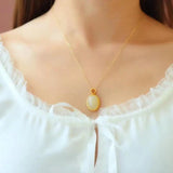Hetian Jade Egg Pendant Necklace with Silver Inlay