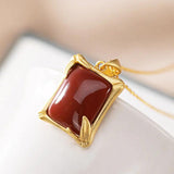 Red Tourmaline Pendant Necklace with Silver Inlay