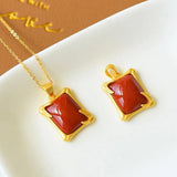 Red Tourmaline Pendant Necklace with Silver Inlay