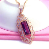 Delicate 14K Rose Necklace with Ruby Pendant