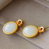 Silver Inlaid Hetian Chalcedony Egg Pendant Necklace