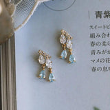 Designer Silver Inlaid Crystal Tassel Earrings