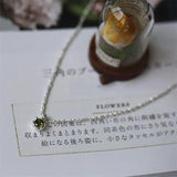 Vintage Olive Green Pendant Necklace with Silver Inlaid Gemstones
