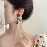 Hand Woven Flower Clip Earrings Red Green Beads Braided Flower Shape