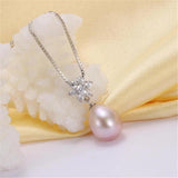 Natural Freshwater Oval Pearl Necklace 925 Sterling Silver Zircon Flower Pendant