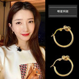 Starmoon Silver Geometric Knotted Earrings