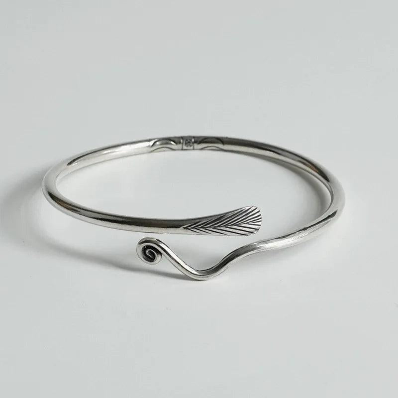 XIYANIKE Silver Hot Peacock Feather Bracelet Distressed Pattern Gift Couple