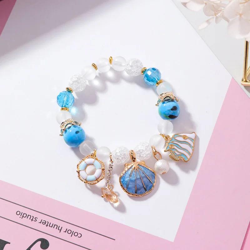 Glass Crystal Beaded Bracelet with Shell Fish Pendant
