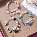 Glass Crystal Beaded Bracelet with Shell Fish Pendant