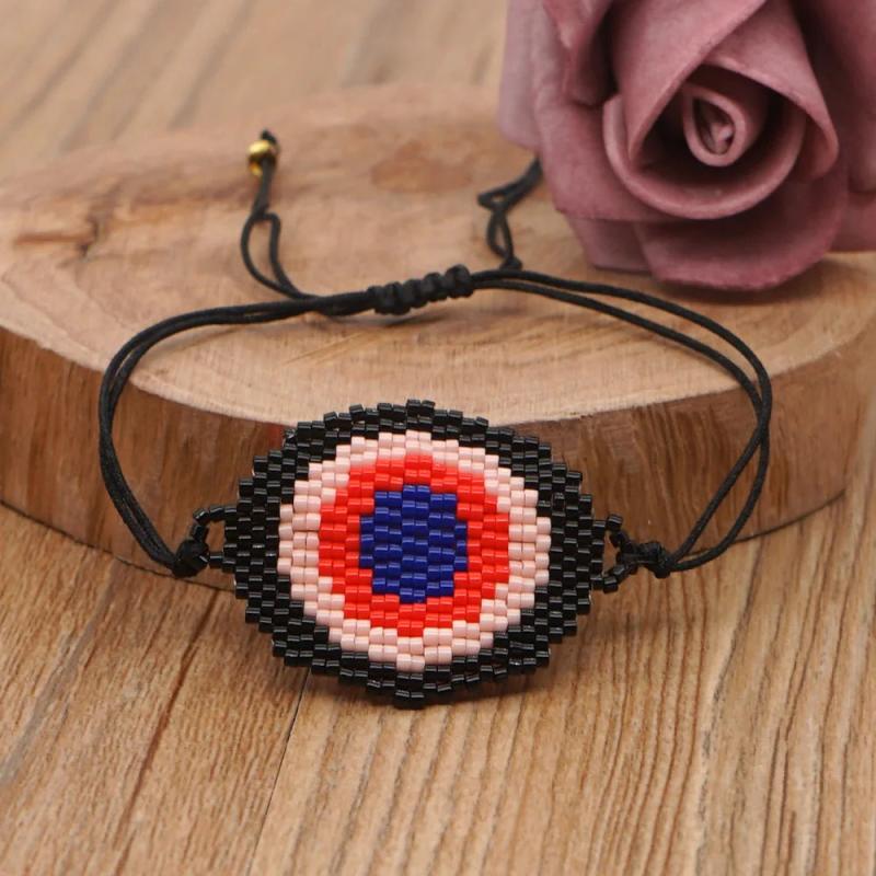Hand-woven Rice Bead Bracelet with Devil's Eye Charm