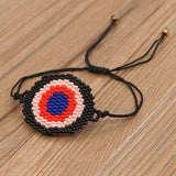 Hand-woven Rice Bead Bracelet with Devil's Eye Charm