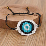 Hand-woven Rice Bead Bracelet with Devil's Eye Charm