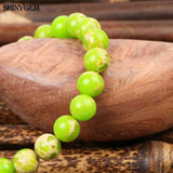 Multicolor Sea Sediment Jasper Bracelet with Big Shell Pearl