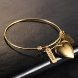 Stainless Steel Coil Bangle Bracelet With Charms