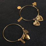 Stainless Steel Coil Bangle Bracelet With Charms