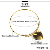 Stainless Steel Coil Bangle Bracelet With Charms