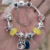 Silver-plated Bracelet with Floral Bead Charms