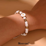 Shell Daisy Charm Bracelet Mother of Pearl Hematite Beads