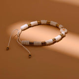Shell Daisy Charm Bracelet Mother of Pearl Hematite Beads