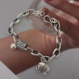 Vintage Silver Elephant Bracelet with Round Bead Pendant