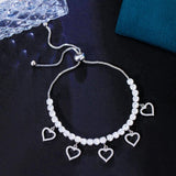 Pera Adjustable CZ Crystal Heart Charms Link Bracelet