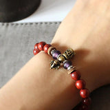 Handmade Blue Beaded Bracelet with Silver Charm