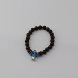 Handmade Blue Beaded Bracelet with Silver Charm