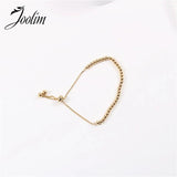 Fashionable PVD Plated Pearl Cord Pull Bracelet Drop