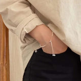 Fashionable PVD Plated Pearl Cord Pull Bracelet Drop
