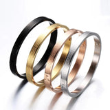 Women's Stainless Steel Cross Logo Bangle - Wedding Jewelry