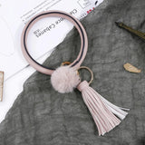 Woman PU Leather Metal Keychain Wrist Jewelry Hair Ball Tassel Bracelet Key Ring