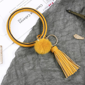 Woman PU Leather Metal Keychain Wrist Jewelry Hair Ball Tassel Bracelet Key Ring
