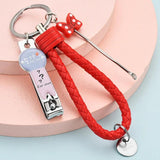 Woven Leather Rope Nail Clippers Ear Spoon Keychain Pendant