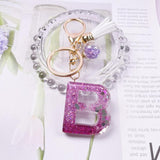 Crystal drop glue key chain tassel pendant resin key chain Glass flower bulb