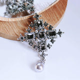 Muylinda Vintage Cross Brooch Pin Champagne Crystal Metal Brooch