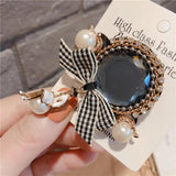 Retro Character Bow Pearl Pin Brooch