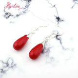 Coral Red Olivary Stone Earrings Tibetan Silver Hook Style