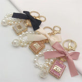 Crystal Bottle Keychain Bow Tie Bag Pendant Jewelry