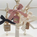 Crystal Bottle Keychain Bow Tie Bag Pendant Jewelry