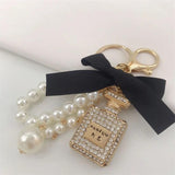 Crystal Bottle Keychain Bow Tie Bag Pendant Jewelry