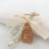 Crystal Bottle Keychain Bow Tie Bag Pendant Jewelry